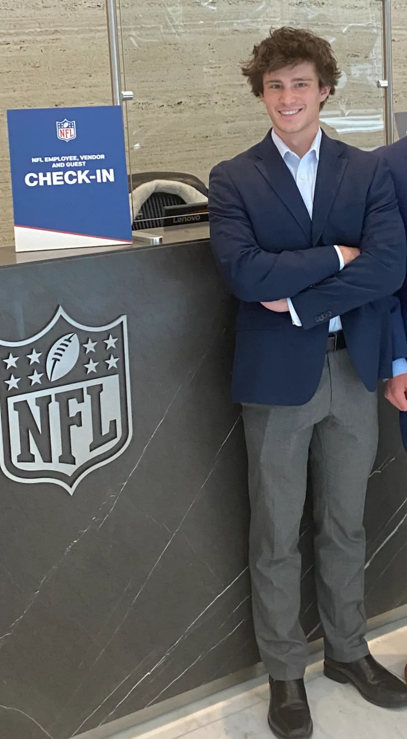 Jackson Thorn, smiling, in a navy blazer.